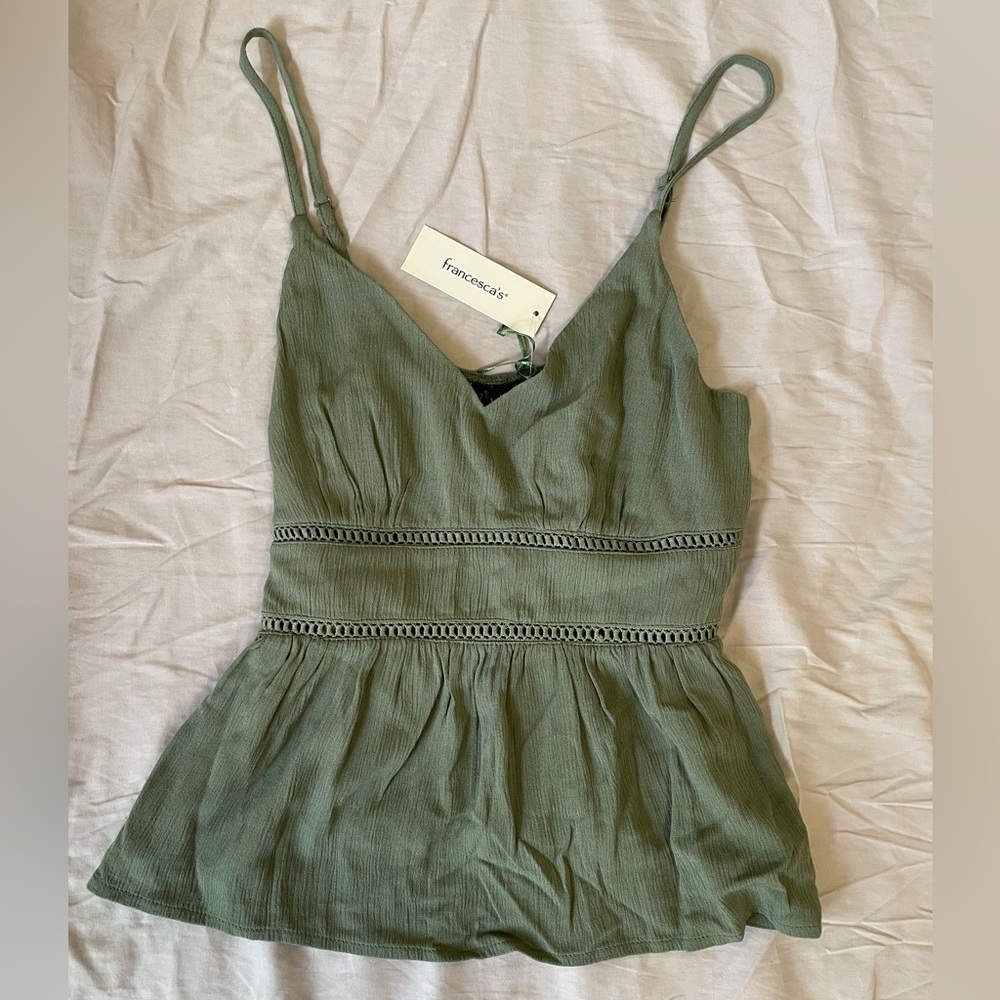 Francesca’s green tank top
